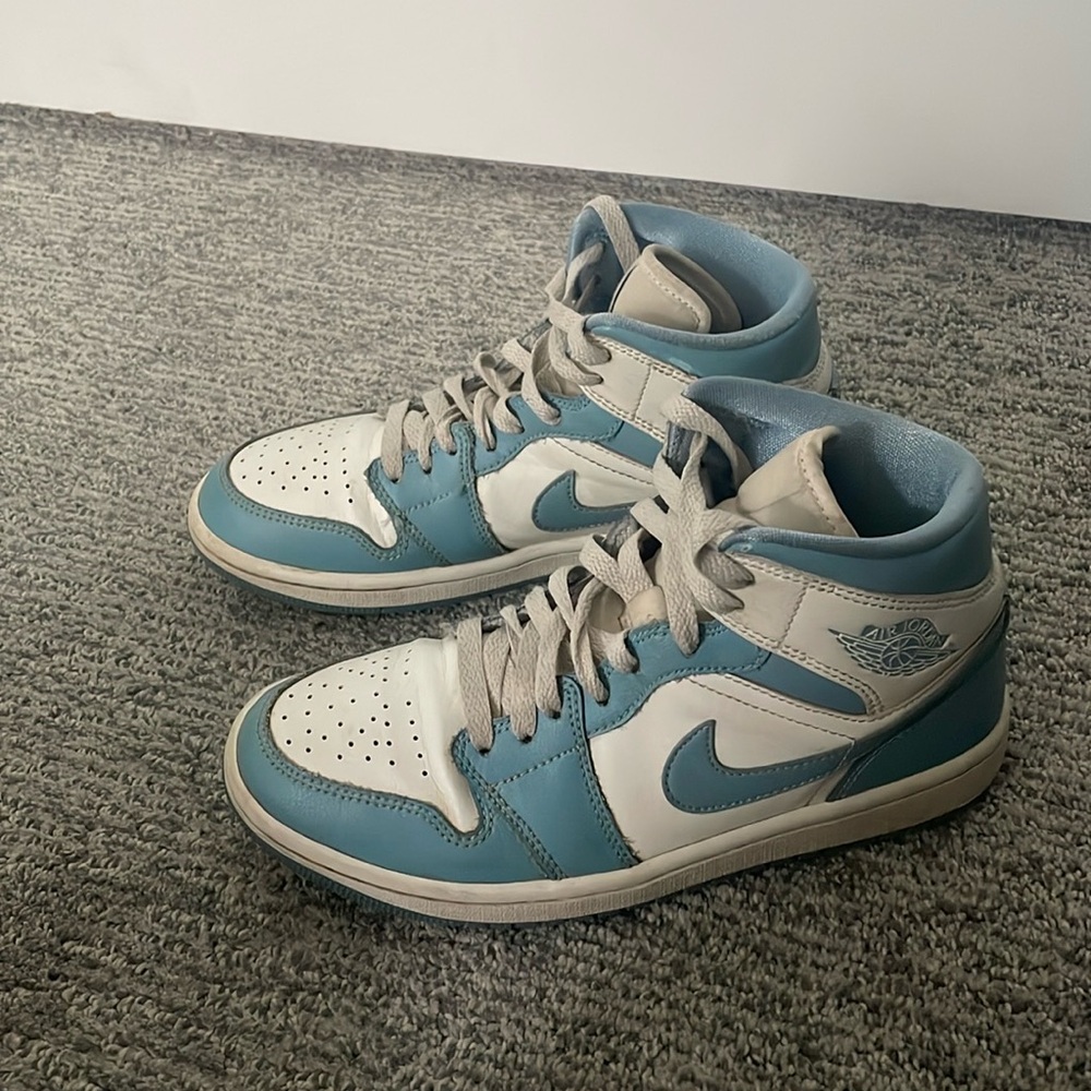 Light blue Nike Jordan 1s